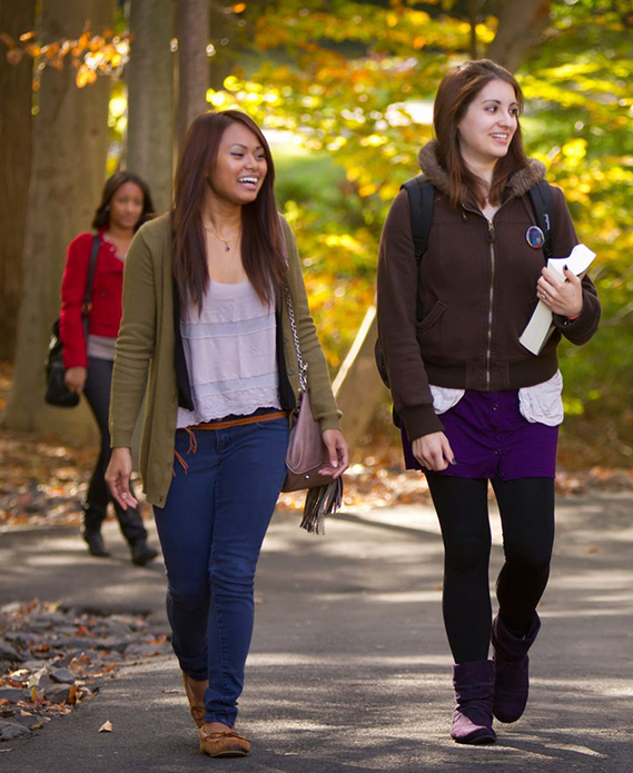 Penn State Division of Undergraduate Studies- students walking across campus in fall